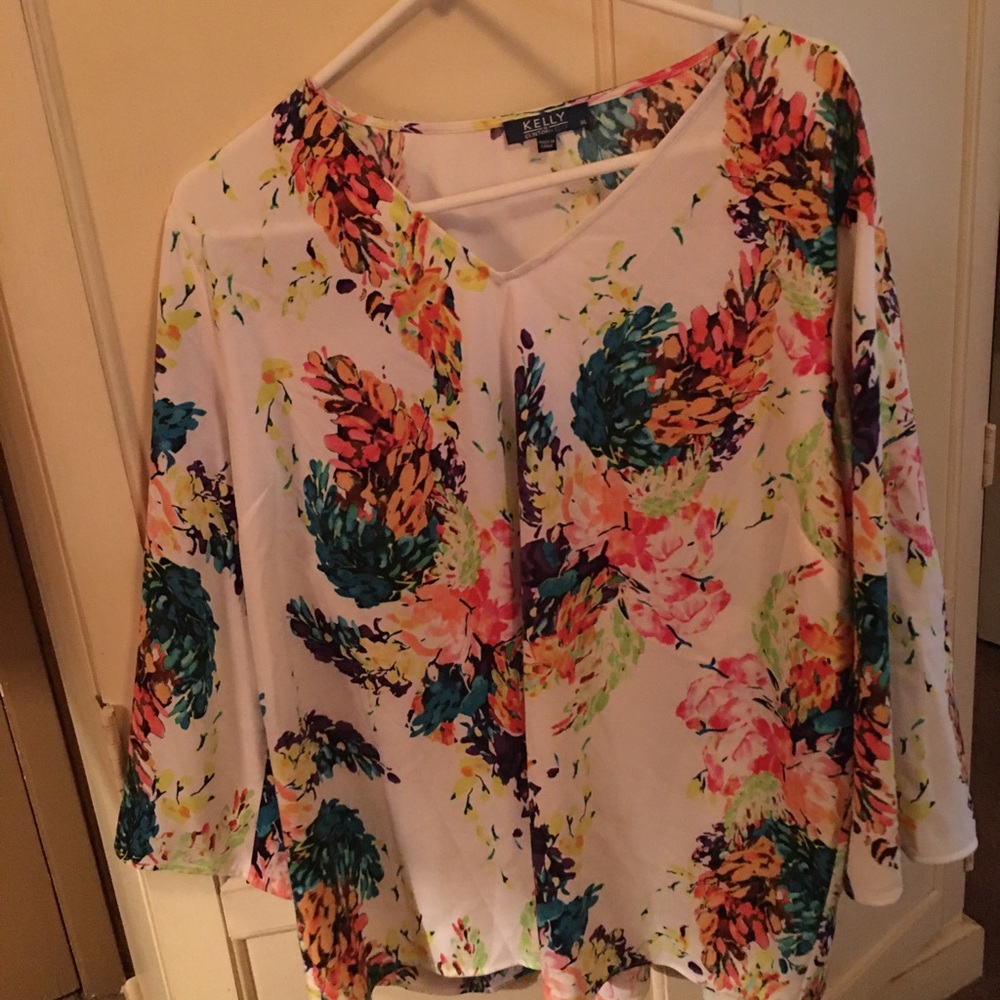 White, multi colored print, silky feeling material open shoulder sleeves